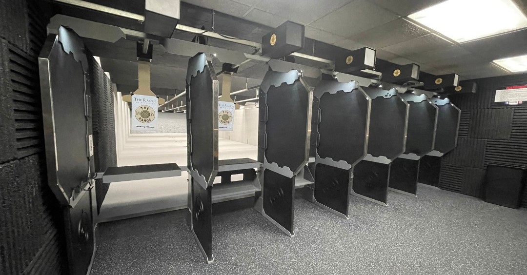 Indoor shooting range with empty lanes.