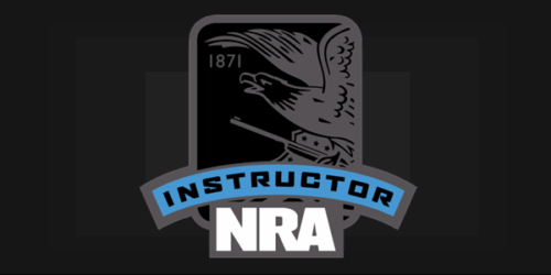 NRA Instructor emblem featuring an eagle and rifle from 1871.